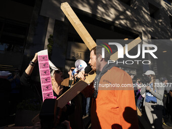 The women's march takes place in Washington, D.C., on November 2, 2024, where thousands of people gather at Freedom Plaza. Eight counter-pro...