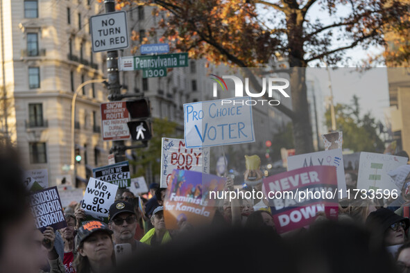 The women's march takes place in Washington, D.C., on November 2, 2024, where thousands of people gather at Freedom Plaza. Eight counter-pro...