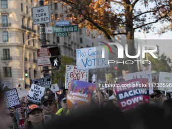 The women's march takes place in Washington, D.C., on November 2, 2024, where thousands of people gather at Freedom Plaza. Eight counter-pro...