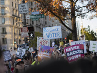 The women's march takes place in Washington, D.C., on November 2, 2024, where thousands of people gather at Freedom Plaza. Eight counter-pro...