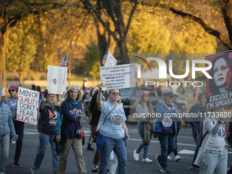 The women's march takes place in Washington, D.C., on November 2, 2024, where thousands of people gather at Freedom Plaza. Eight counter-pro...