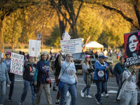 The women's march takes place in Washington, D.C., on November 2, 2024, where thousands of people gather at Freedom Plaza. Eight counter-pro...