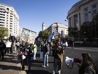 The women's march takes place in Washington, D.C., on November 2, 2024, where thousands of people gather at Freedom Plaza. Eight counter-pro...