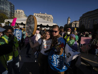 The women's march takes place in Washington, D.C., on November 2, 2024, where thousands of people gather at Freedom Plaza. Eight counter-pro...