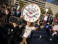 The women's march takes place in Washington, D.C., on November 2, 2024, where thousands of people gather at Freedom Plaza. Eight counter-pro...