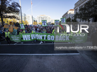 The women's march takes place in Washington, D.C., on November 2, 2024, where thousands of people gather at Freedom Plaza. Eight counter-pro...