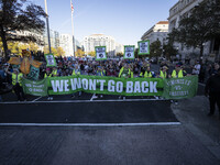 The women's march takes place in Washington, D.C., on November 2, 2024, where thousands of people gather at Freedom Plaza. Eight counter-pro...