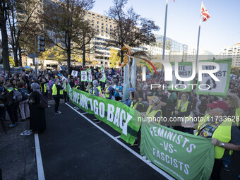 The women's march takes place in Washington, D.C., on November 2, 2024, where thousands of people gather at Freedom Plaza. Eight counter-pro...