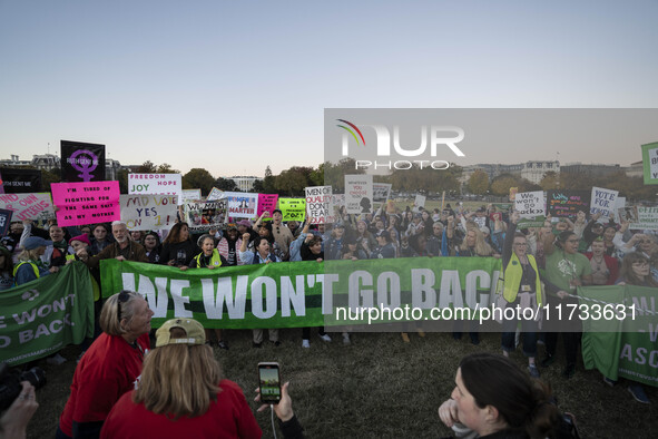 The women's march takes place in Washington, D.C., on November 2, 2024, where thousands of people gather at Freedom Plaza. Eight counter-pro...