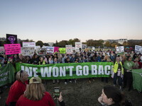 The women's march takes place in Washington, D.C., on November 2, 2024, where thousands of people gather at Freedom Plaza. Eight counter-pro...