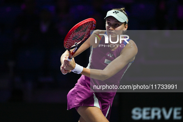 RIYADH, SAUDI ARABIA - NOVEMBER 02: Elena Rybakina of Kazakhstan in action during her match against Jasmine Paolini of Italy at the 2024 WTA...