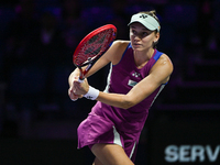 RIYADH, SAUDI ARABIA - NOVEMBER 02: Elena Rybakina of Kazakhstan in action during her match against Jasmine Paolini of Italy at the 2024 WTA...