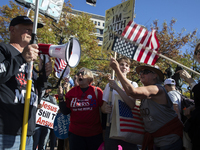 Abortion rights and anti-abortion rights activists protest together during the National Women's March at Freedom Plaza in Washington DC, USA...