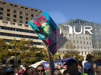 Anti-abortion rights activists protest during the National Women's March at Freedom Plaza in Washington DC, USA, on November 2, 2024. Just d...