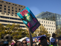 Anti-abortion rights activists protest during the National Women's March at Freedom Plaza in Washington DC, USA, on November 2, 2024. Just d...