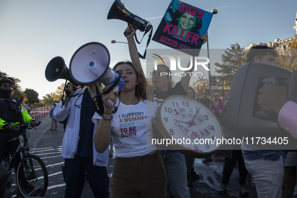 Anti-abortion rights activists protest during the National Women's March in Washington DC, USA, on November 2, 2024. Just days before the US...