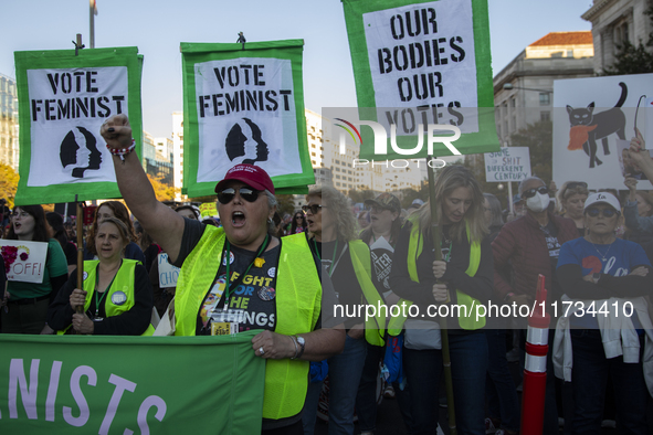 Demonstrators chant slogans during the National Women's March in Washington DC, USA, on November 2, 2024. Just days before the US Election,...