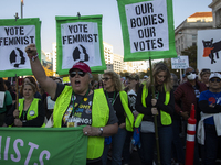 Demonstrators chant slogans during the National Women's March in Washington DC, USA, on November 2, 2024. Just days before the US Election,...