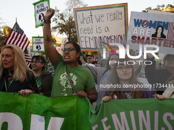 Demonstrators chant slogans during the National Women's March in Washington DC, USA, on November 2, 2024. Just days before the US Election,...