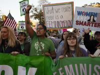 Demonstrators chant slogans during the National Women's March in Washington DC, USA, on November 2, 2024. Just days before the US Election,...