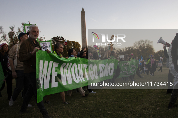 Demonstrators chant slogans during the National Women's March in Washington DC, USA, on November 2, 2024. Just days before the US Election,...