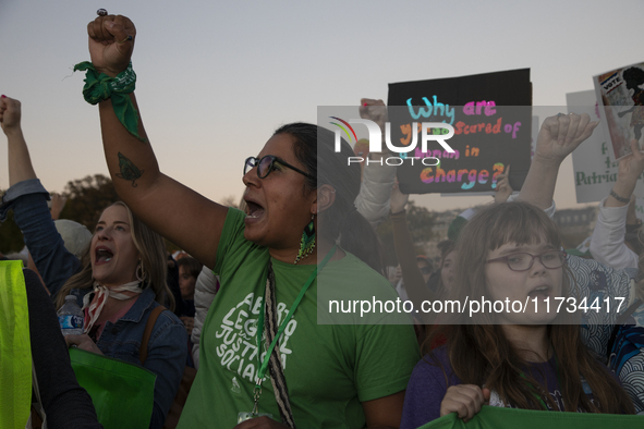 Demonstrators chant slogans during the National Women's March in front of the White House in Washington DC, USA, on November 2, 2024. Just d...