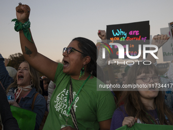 Demonstrators chant slogans during the National Women's March in front of the White House in Washington DC, USA, on November 2, 2024. Just d...