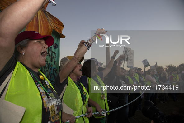 Demonstrators chant slogans during the National Women's March in Washington DC, USA, on November 2, 2024. Just days before the US Election,...