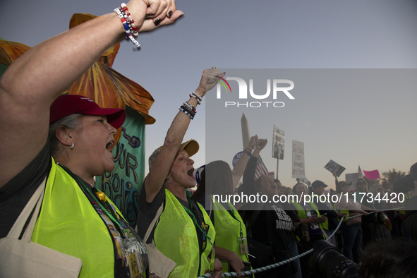 Demonstrators chant slogans during the National Women's March in Washington DC, USA, on November 2, 2024. Just days before the US Election,...