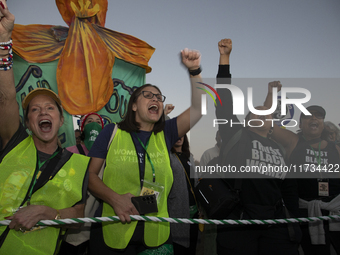 Demonstrators chant slogans during the National Women's March in front of the White House in Washington DC, USA, on November 2, 2024. Just d...