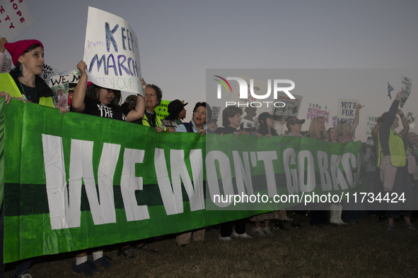 Demonstrators chant slogans during the National Women's March in front of the White House in Washington DC, USA, on November 2, 2024. Just d...