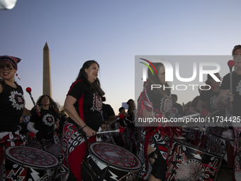 Drummers perform during the National Women's March in Washington DC, USA, on November 2, 2024. Just days before the US Election, thousands o...