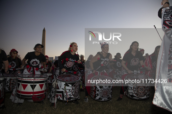 Drummers perform during the National Women's March in Washington DC, USA, on November 2, 2024. Just days before the US Election, thousands o...