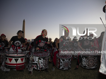 Drummers perform during the National Women's March in Washington DC, USA, on November 2, 2024. Just days before the US Election, thousands o...