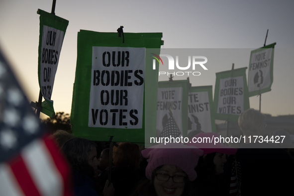 Thousands of demonstrators attend the Women's March in support of Vice President Kamala Harris in Washington DC, USA, on November 2, 2024. T...