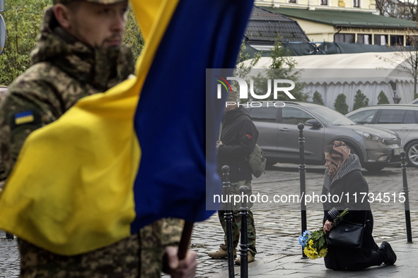 Relatives, friends, and comrades attend a funeral ceremony for Vasyl Mykytyshyn and Yuriy Pronyuk, who are killed at the front defending Ukr...