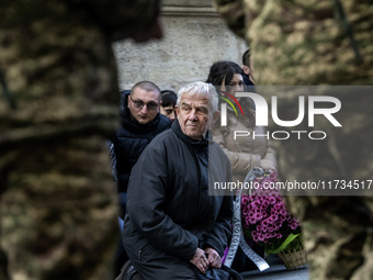 Relatives, friends, and comrades attend a funeral ceremony for Vasyl Mykytyshyn and Yuriy Pronyuk, who are killed at the front defending Ukr...