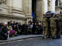 Relatives, friends, and comrades attend a funeral ceremony for Vasyl Mykytyshyn and Yuriy Pronyuk, who are killed at the front defending Ukr...