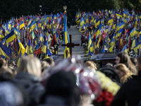 Relatives, friends, and comrades attend a funeral ceremony for Vasyl Mykytyshyn and Yuriy Pronyuk, who are killed at the front defending Ukr...