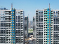 An aerial photo taken in Hangzhou, China, on November 3, 2024, shows a newly built commercial housing complex. According to the Ministry of...