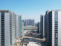 An aerial photo taken in Hangzhou, China, on November 3, 2024, shows a newly built commercial housing complex. According to the Ministry of...