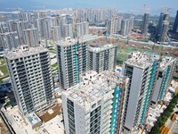 An aerial photo taken in Hangzhou, China, on November 3, 2024, shows a newly built commercial housing complex. According to the Ministry of...