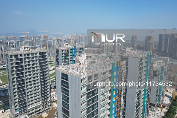 An aerial photo taken in Hangzhou, China, on November 3, 2024, shows a newly built commercial housing complex. According to the Ministry of...