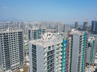 An aerial photo taken in Hangzhou, China, on November 3, 2024, shows a newly built commercial housing complex. According to the Ministry of...