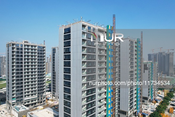 An aerial photo taken in Hangzhou, China, on November 3, 2024, shows a newly built commercial housing complex. According to the Ministry of...