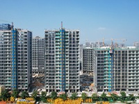 An aerial photo taken in Hangzhou, China, on November 3, 2024, shows a newly built commercial housing complex. According to the Ministry of...