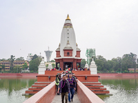 People return after participating in the Bhaitika pooja at Balgopaleshwar Temple in Kathmandu, Nepal, on November 3, 2024. (