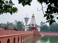 People walk to participate in the Bhaitika pooja at Balgopaleshwar Temple in Kathmandu, Nepal, on November 3, 2024. (