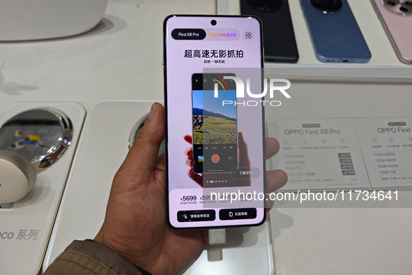 An OPPO Find X8 mobile phone is for sale at an OPPO store in Shanghai, China, on November 3, 2024. 