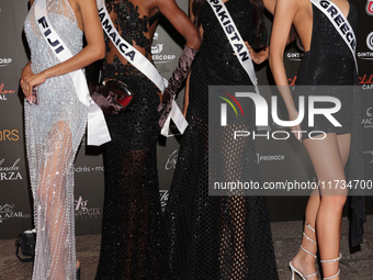 (L-R) Miss Fiji Manshika Prasad, Miss Jamaica Rachel Silvera, Miss Pakistan Noor Xarmina, and Miss Greece Christianna Katsieri attend the re...